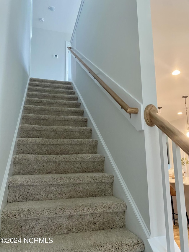 stairs with recessed lighting