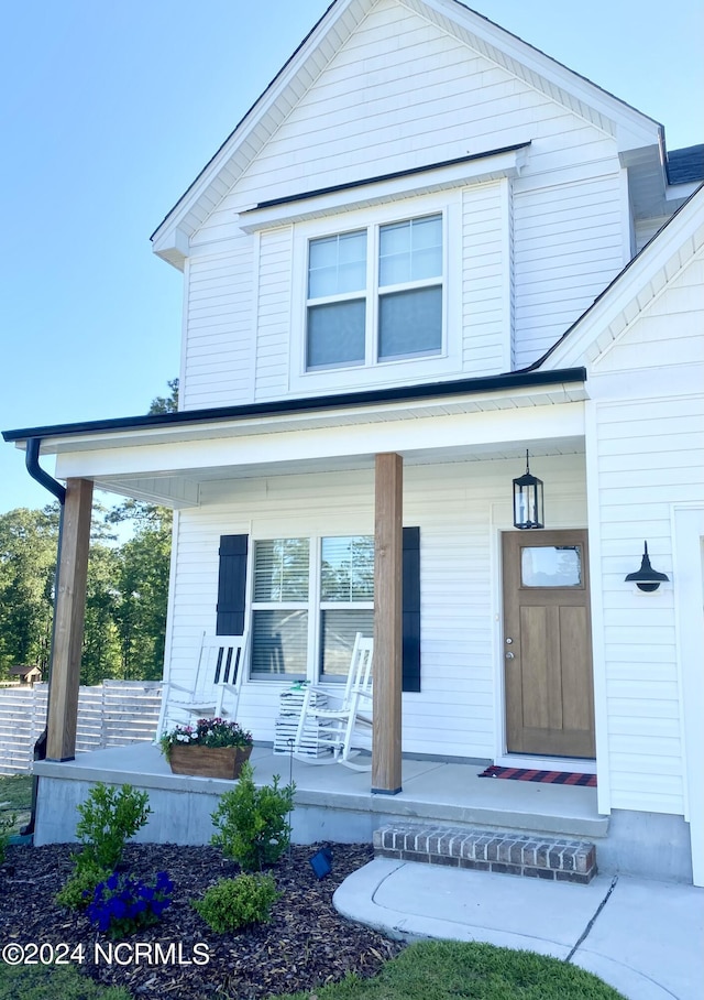 exterior space featuring covered porch