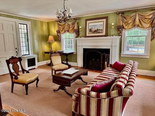 bedroom featuring access to exterior, crown molding, and french doors