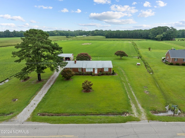 birds eye view of property with a rural view