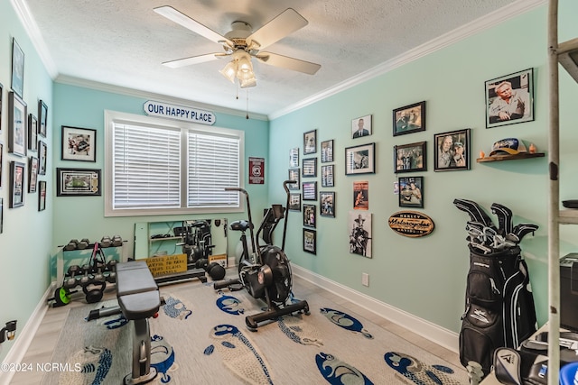 1409 Inlet St, Sunset Beach, NC 28468 - workout room with a textured ceiling, ornamental molding, ceiling fan, baseboards, and wood finished floors