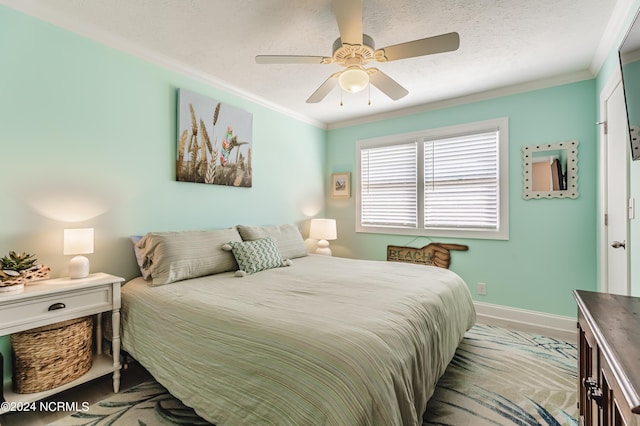 1409 Inlet St, Sunset Beach, NC 28468 - bedroom featuring crown molding, baseboards, and ceiling fan