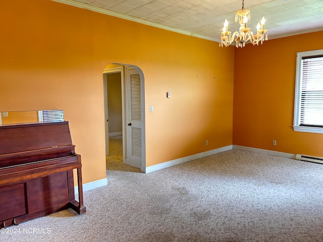 unfurnished room featuring an inviting chandelier, light carpet, and ornamental molding