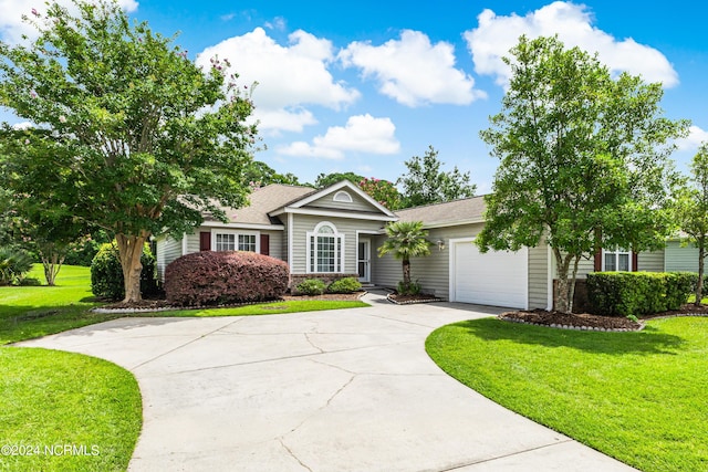 single story home with a garage and a front lawn