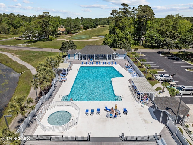 view of swimming pool with a patio area