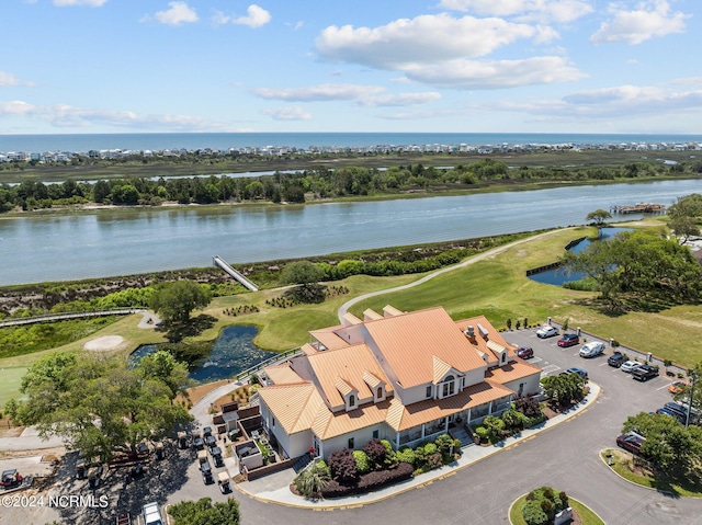 birds eye view of property featuring a water view