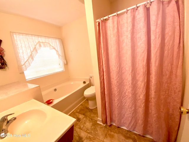 full bathroom featuring toilet, vanity, and independent shower and bath