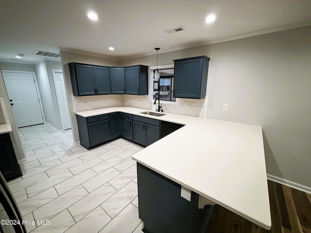 kitchen with backsplash, kitchen peninsula, crown molding, and sink