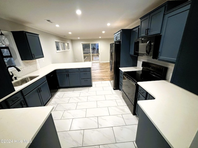 kitchen with appliances with stainless steel finishes, tasteful backsplash, and ornamental molding