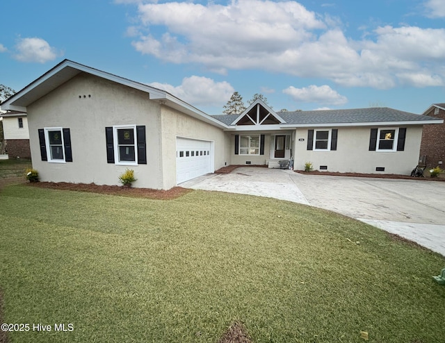 single story home featuring a garage and a front yard