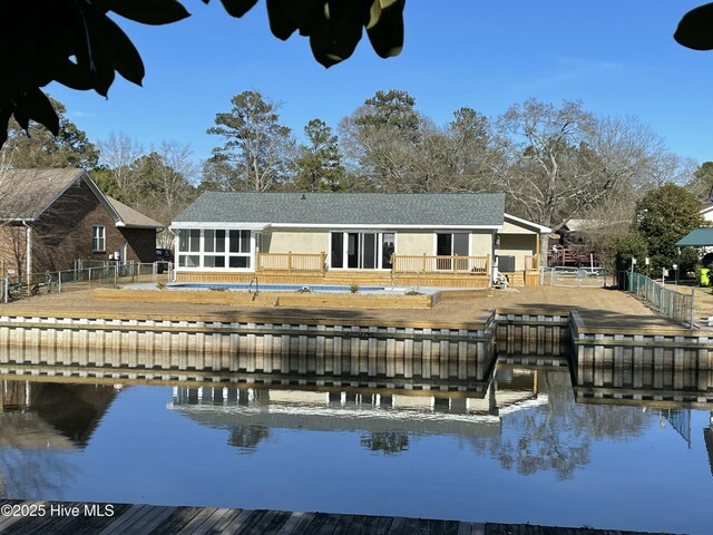 view of swimming pool featuring a deck