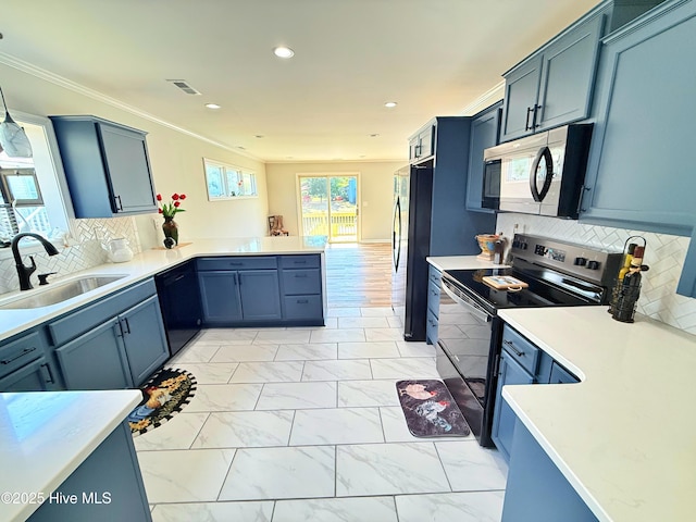 116 Sailors Ct, New Bern, NC 28562 - kitchen with range with electric cooktop, a sink, freestanding refrigerator, a peninsula, and recessed lighting