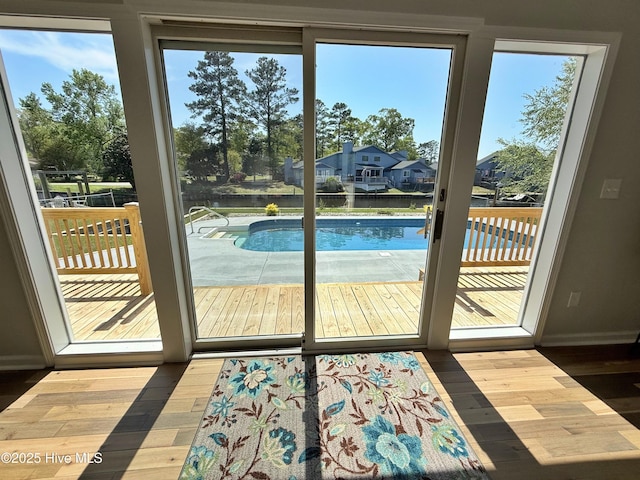 116 Sailors Ct, New Bern, NC 28562 - entryway featuring hardwood / wood-style floors, healthy amount of natural light, and baseboards