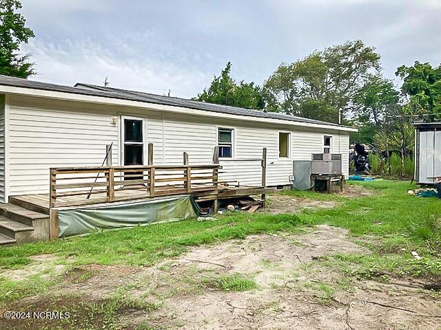 165 Polly Hill Rd, Marshallberg, NC 28553 - back of property with a wooden deck