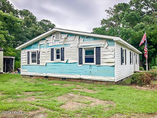 165 Polly Hill Rd, Marshallberg, NC 28553 - view of side of property featuring crawl space and a lawn
