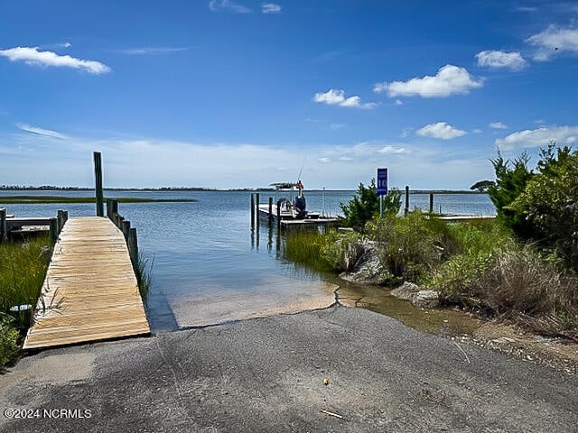 dock area featuring a water view