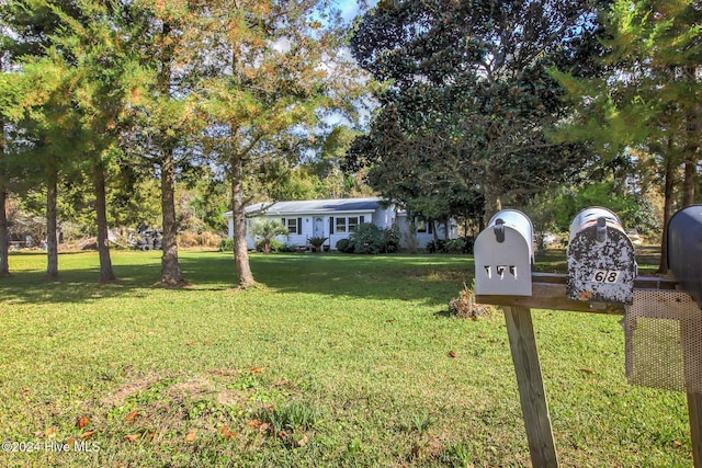 165 Polly Hill Rd, Marshallberg, NC 28553 - view of front of home featuring a front yard