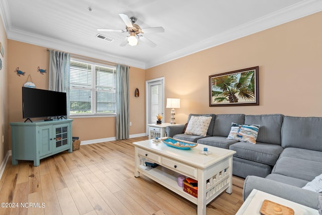 living room featuring ceiling fan, ornamental molding, and light hardwood / wood-style floors