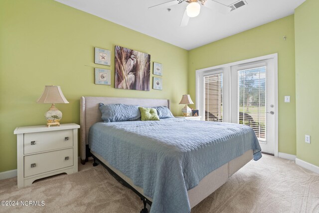 carpeted bedroom with access to exterior and ceiling fan