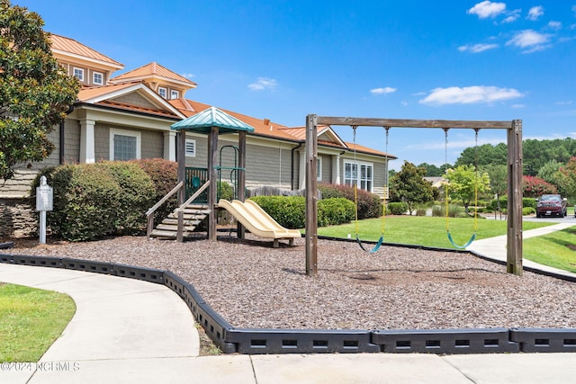 view of playground with a yard