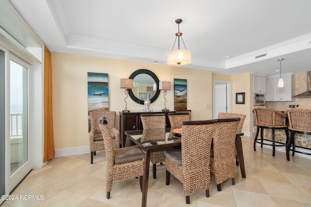 1435 Salter Path Rd Unit E7Grande, Villas, Indian Beach, NC 28512 - dining room with a tray ceiling, ornamental molding, light tile patterned floors, and baseboards
