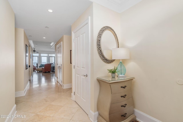 hallway featuring light tile patterned flooring