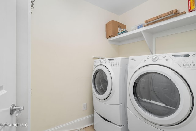 laundry area with separate washer and dryer