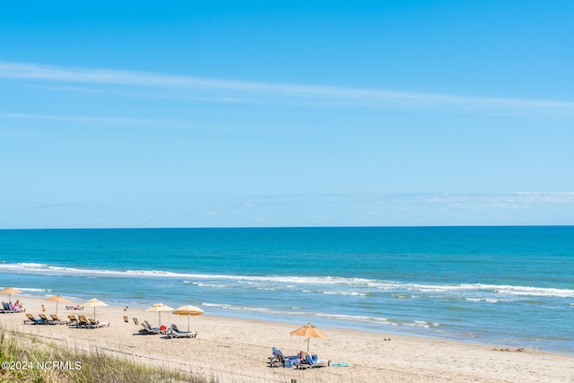 view of water feature featuring a beach view