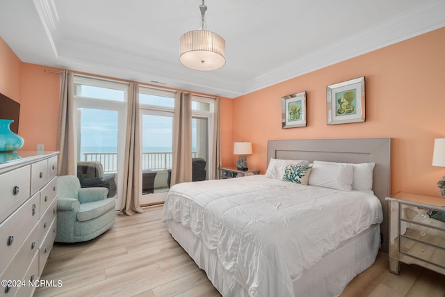 1435 Salter Path Rd Unit E7Grande, Villas, Indian Beach, NC 28512 - bedroom with ornamental molding, light wood-type flooring, a water view, and access to exterior
