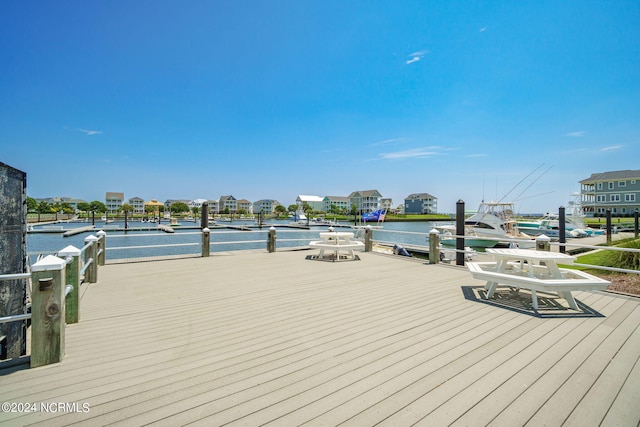 view of dock with a water view