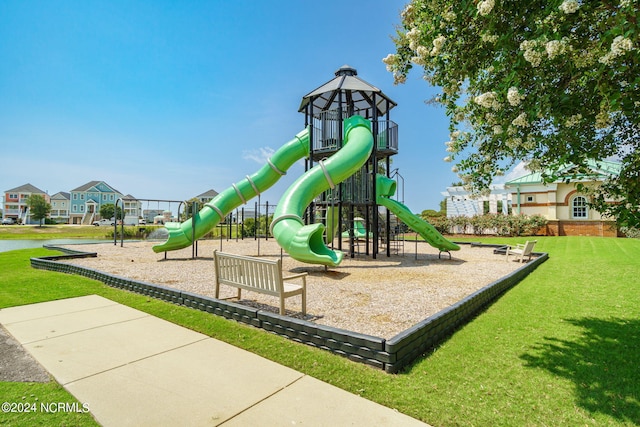 view of playground featuring a lawn