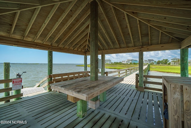 view of dock featuring a water view and a gazebo