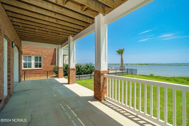 view of patio / terrace with a water view