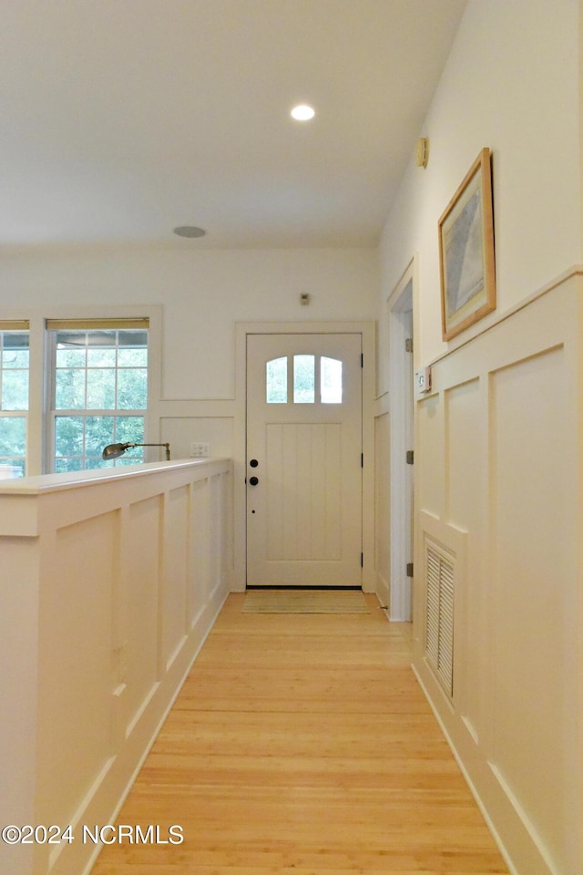 doorway featuring light hardwood / wood-style floors