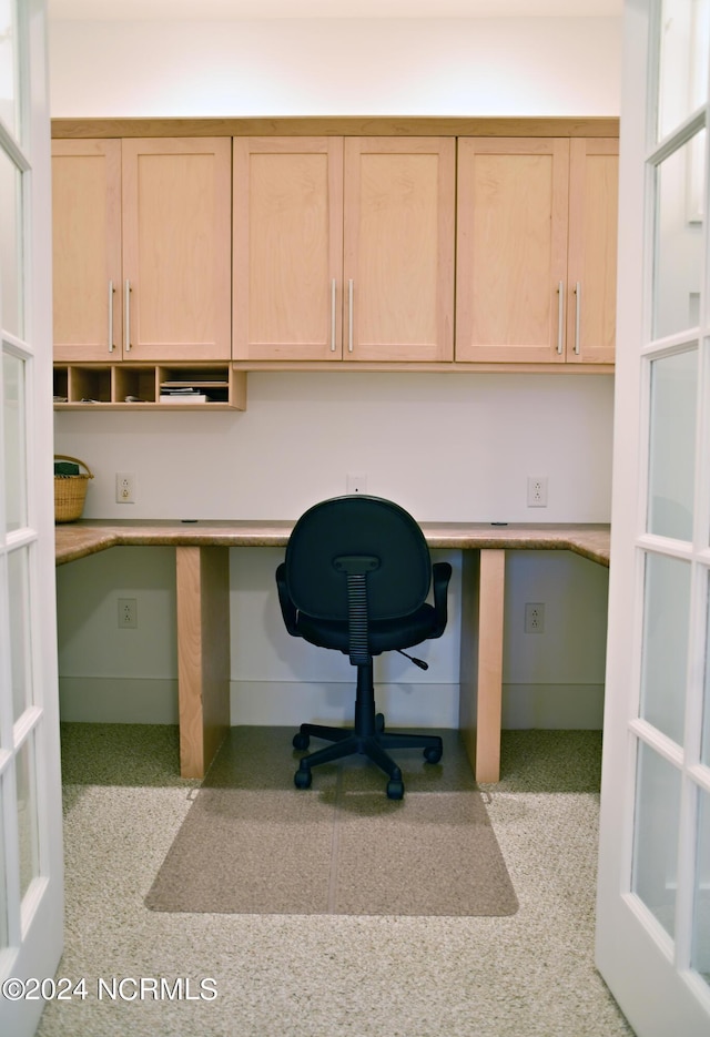 office area with built in desk