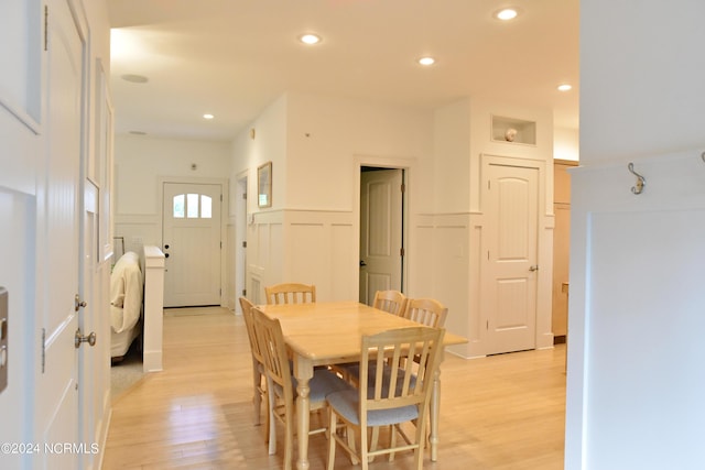 dining area with light hardwood / wood-style floors