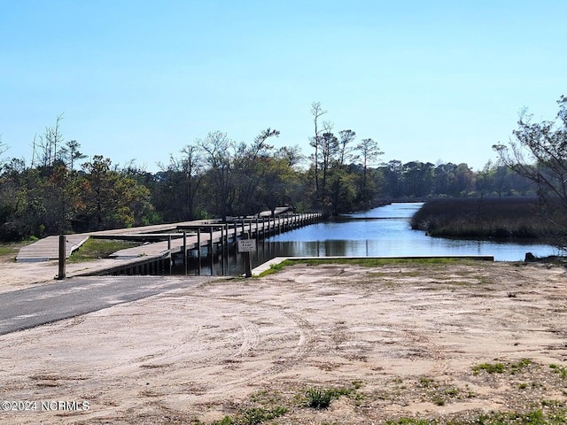 view of dock with a water view