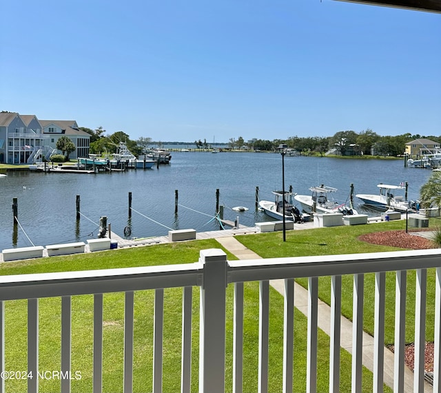 property view of water with a dock