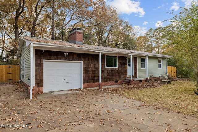 single story home with a garage