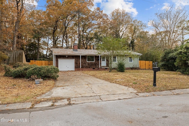 single story home featuring a garage