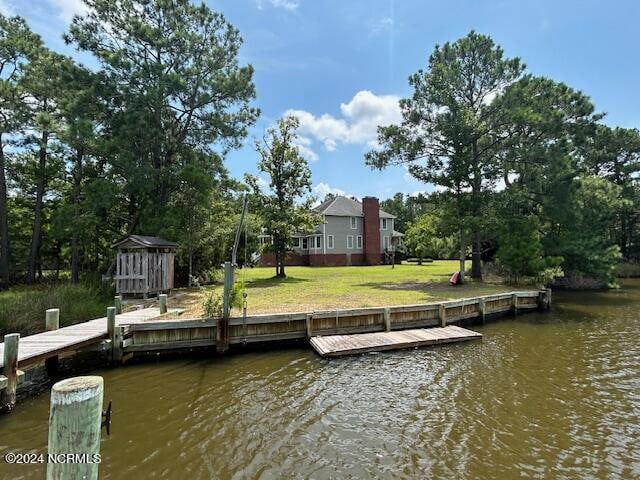 dock area with a water view