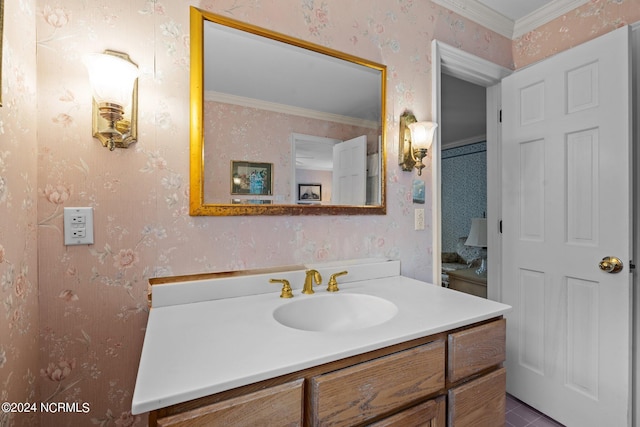 bathroom featuring vanity, tile patterned floors, and crown molding