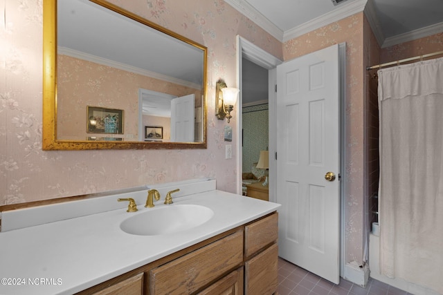 bathroom with tile patterned floors, toilet, vanity, and ornamental molding