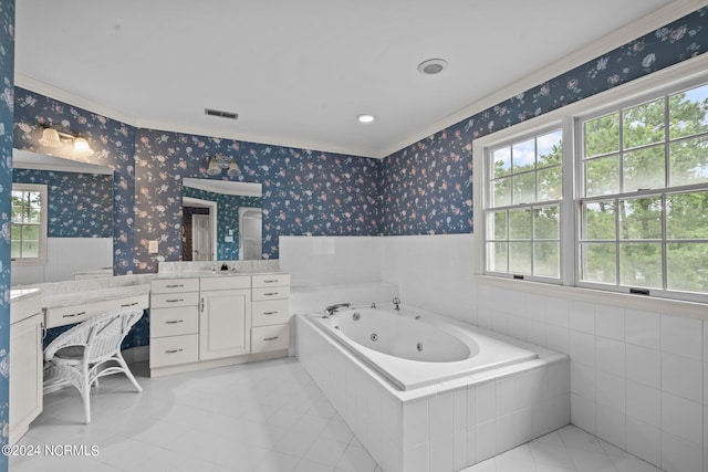 bathroom with tile patterned flooring, a relaxing tiled tub, vanity, and ornamental molding