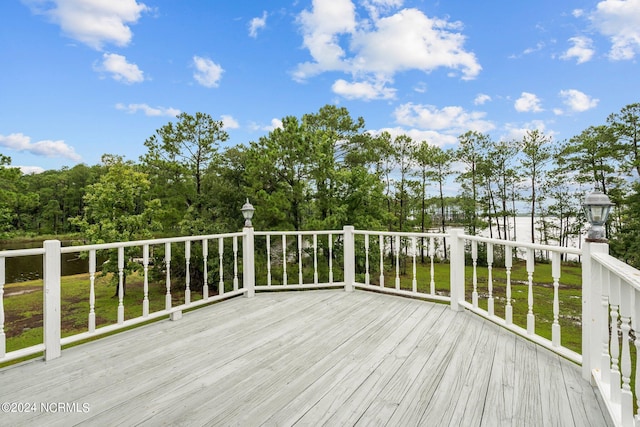 deck featuring a yard