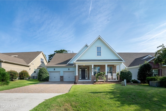 view of front facade with a front yard and a porch