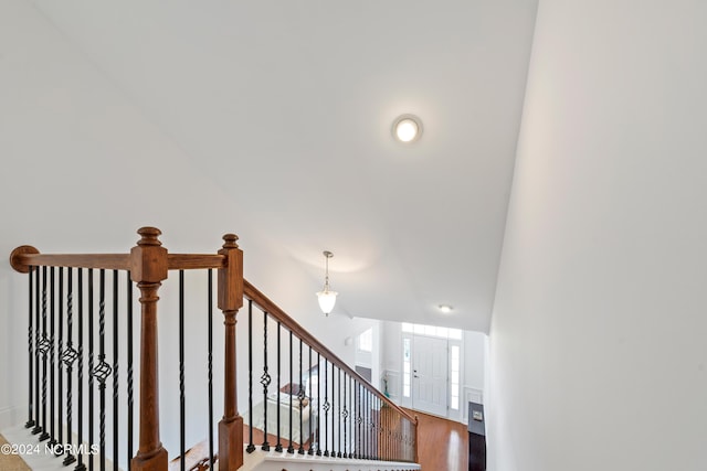 staircase featuring hardwood / wood-style floors