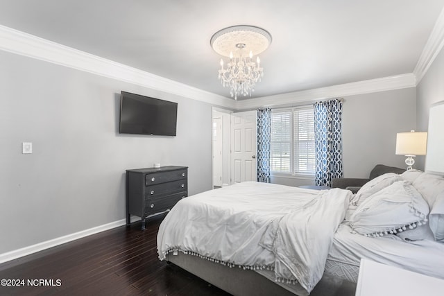 bedroom with dark wood-type flooring, a notable chandelier, and ornamental molding