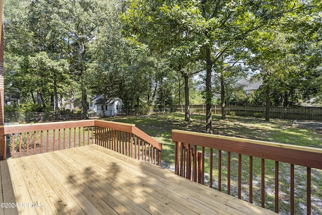 deck featuring a yard