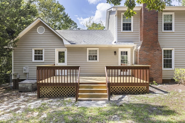 rear view of house with a deck